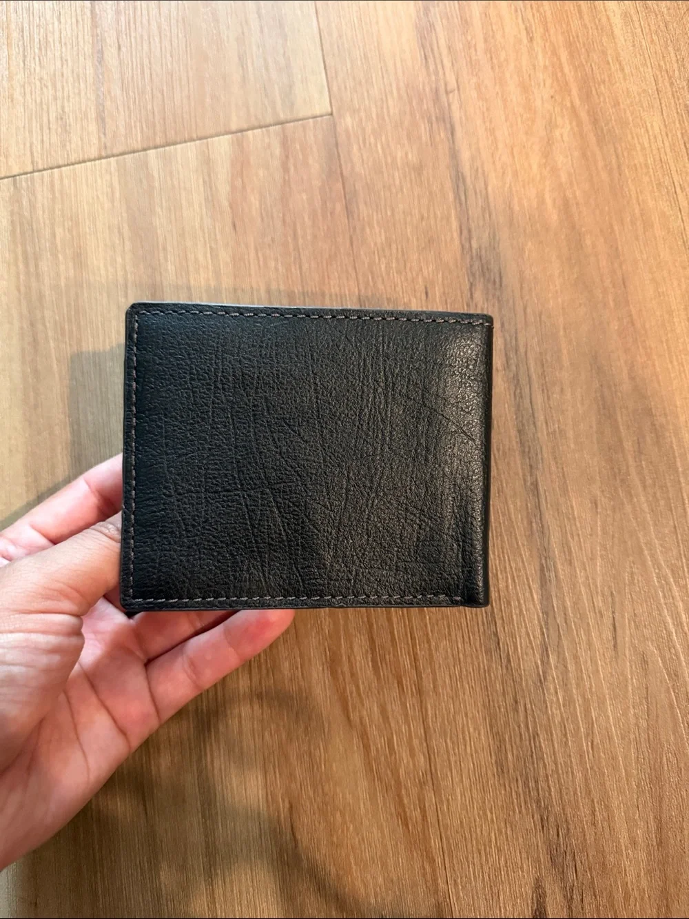 Fossil Black Leather Bifold Wallet with Brown Accent